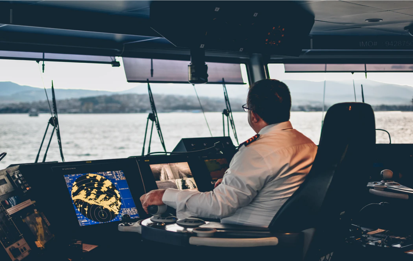 A person using an interactive map to drive a cargo